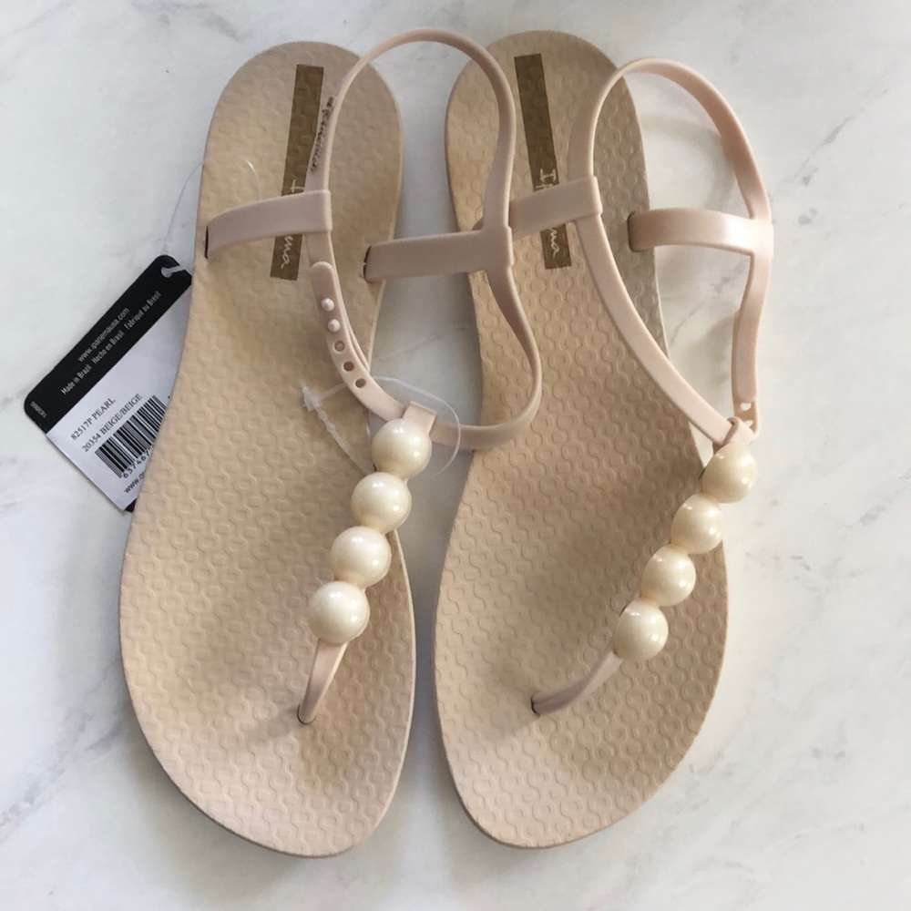 Ipanema Pearl t-strap sandals in beige.  Size 9.